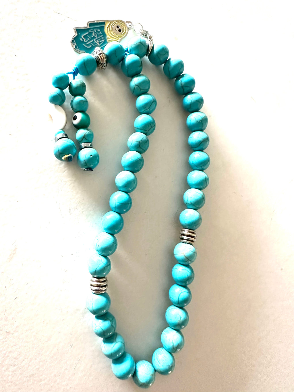 HAGA RANIA TURQUOISE ABAYA CLIP.