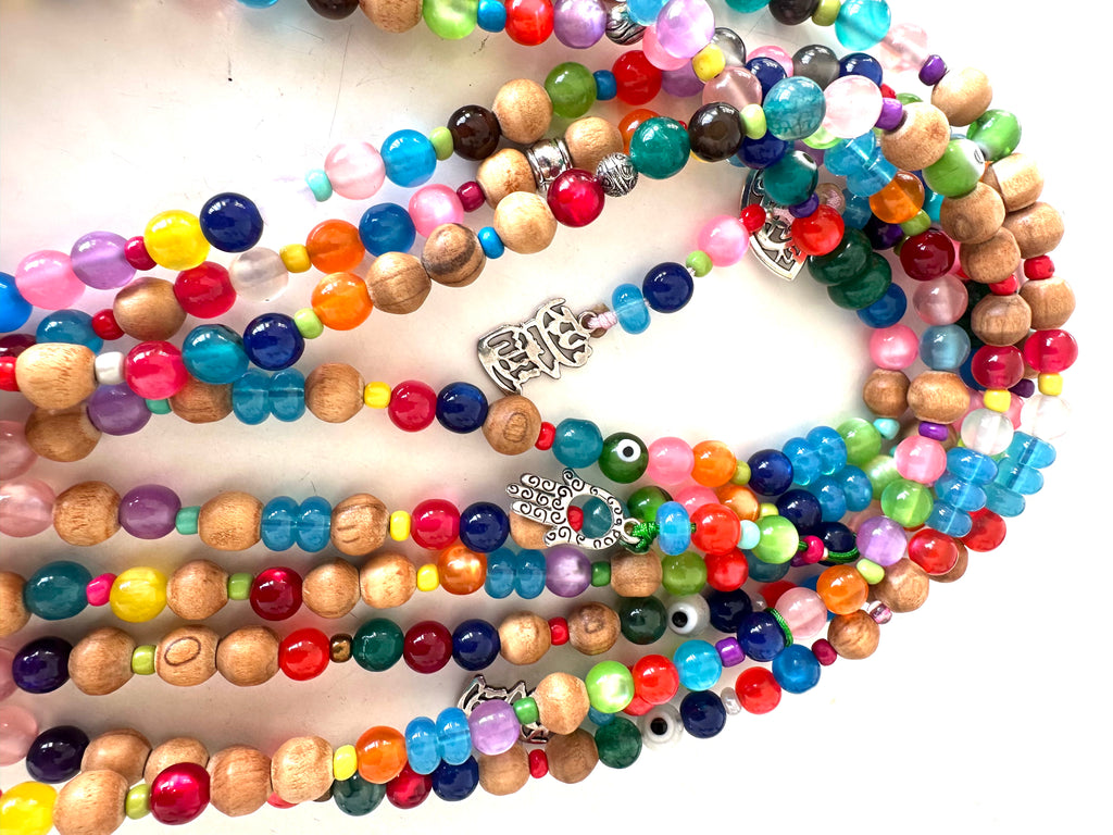 COLORFUL PLASTIC BEADS.