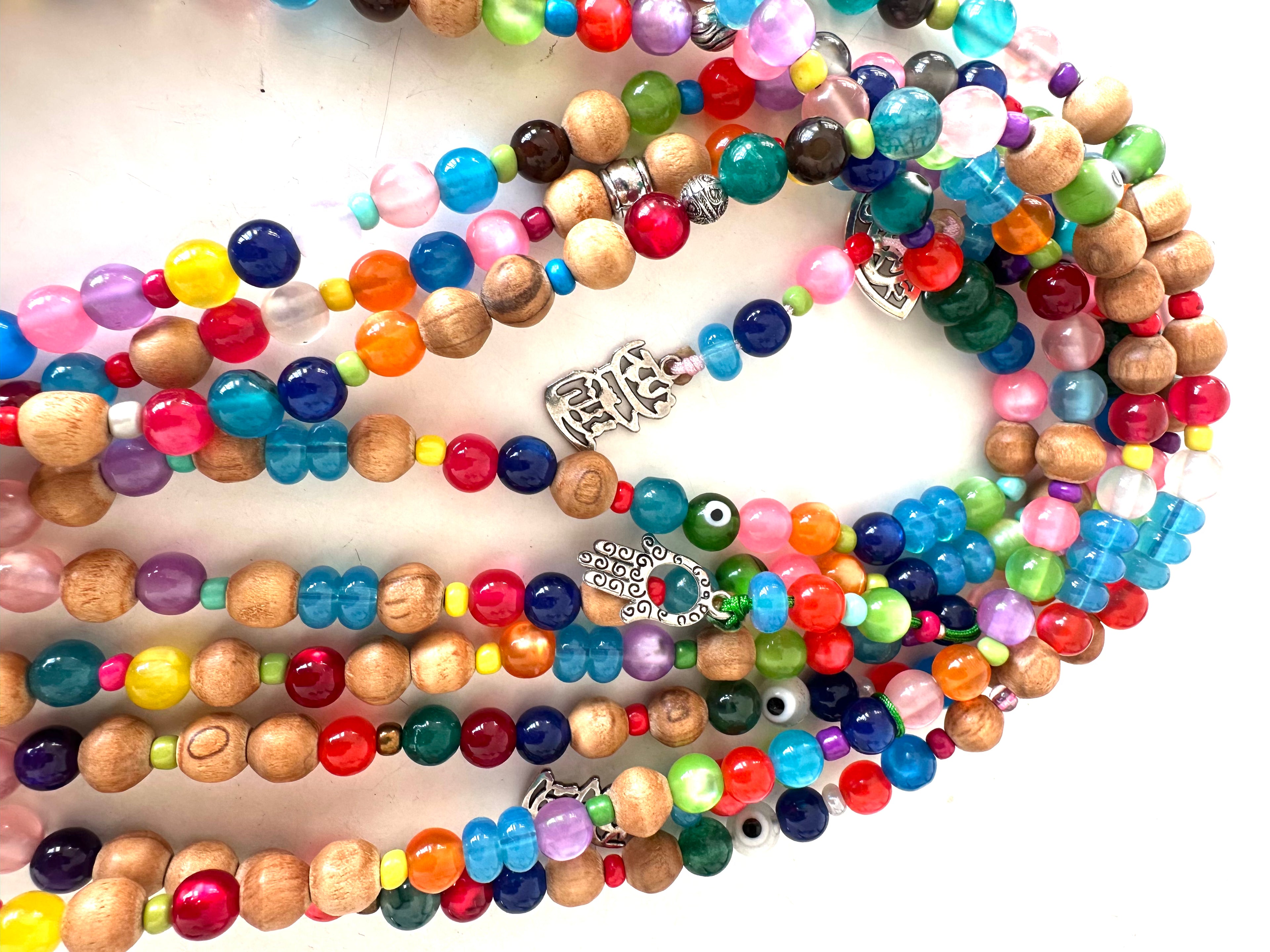 COLORFUL PLASTIC BEADS.