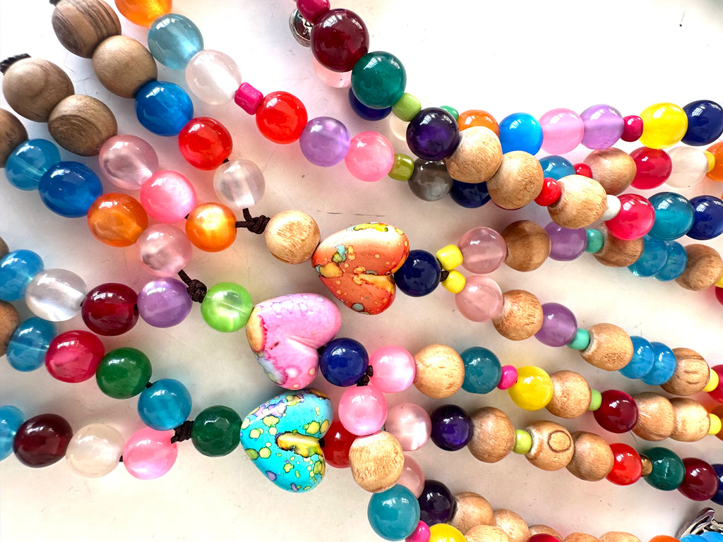 COLORFUL PLASTIC BEADS.