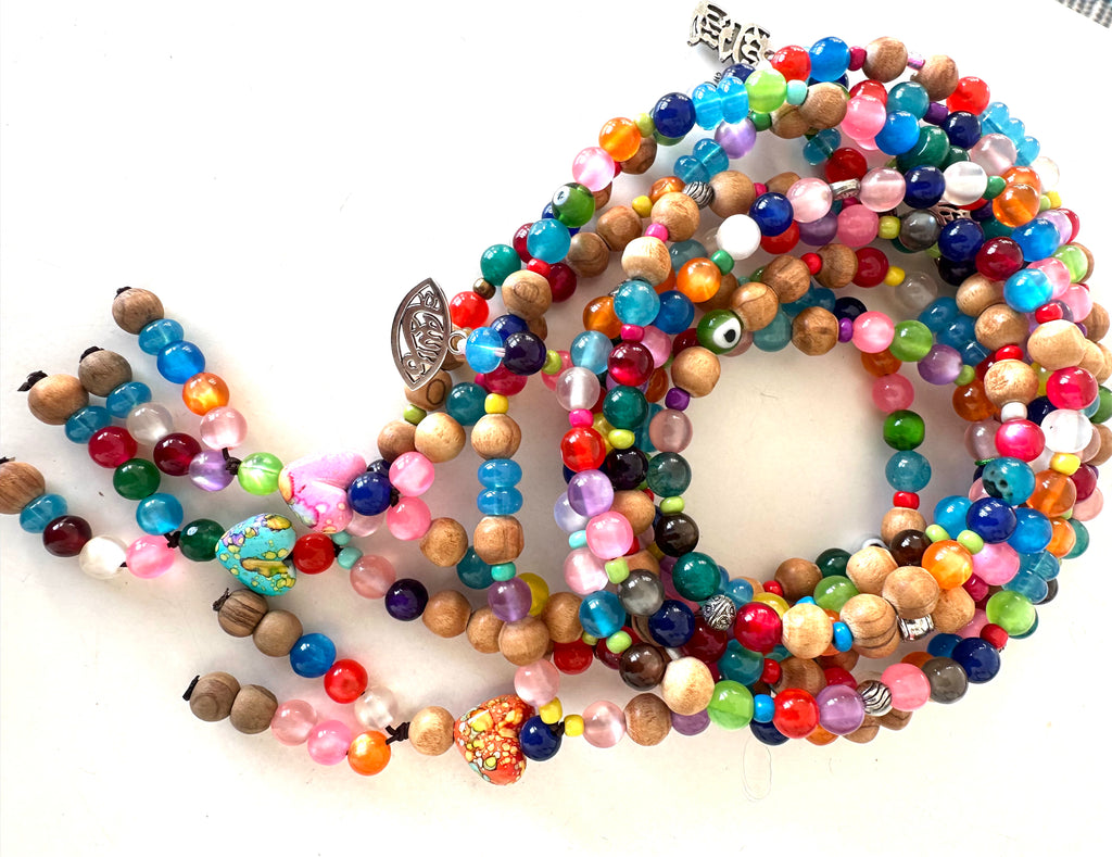 COLORFUL PLASTIC BEADS.