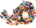 COLORFUL PLASTIC BEADS.