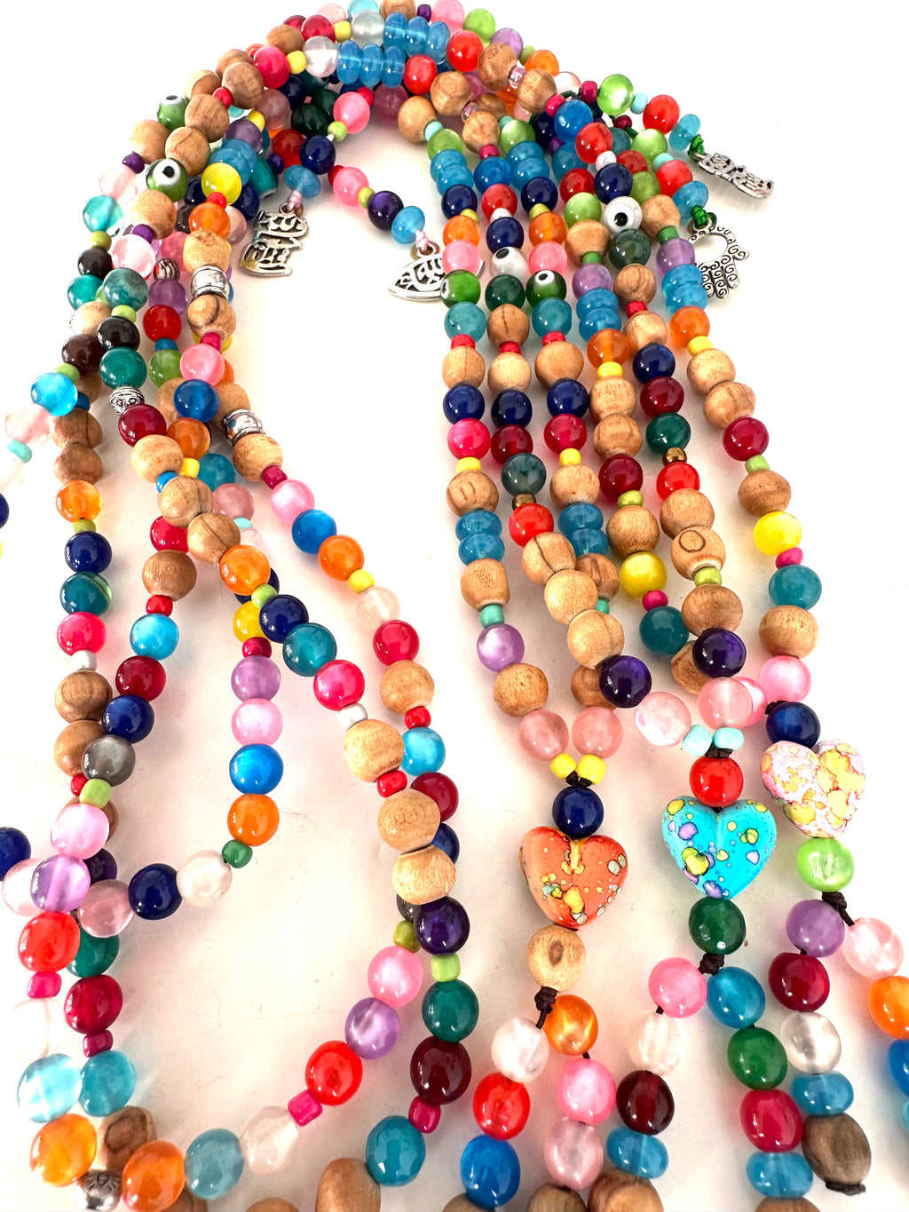 COLORFUL PLASTIC BEADS.