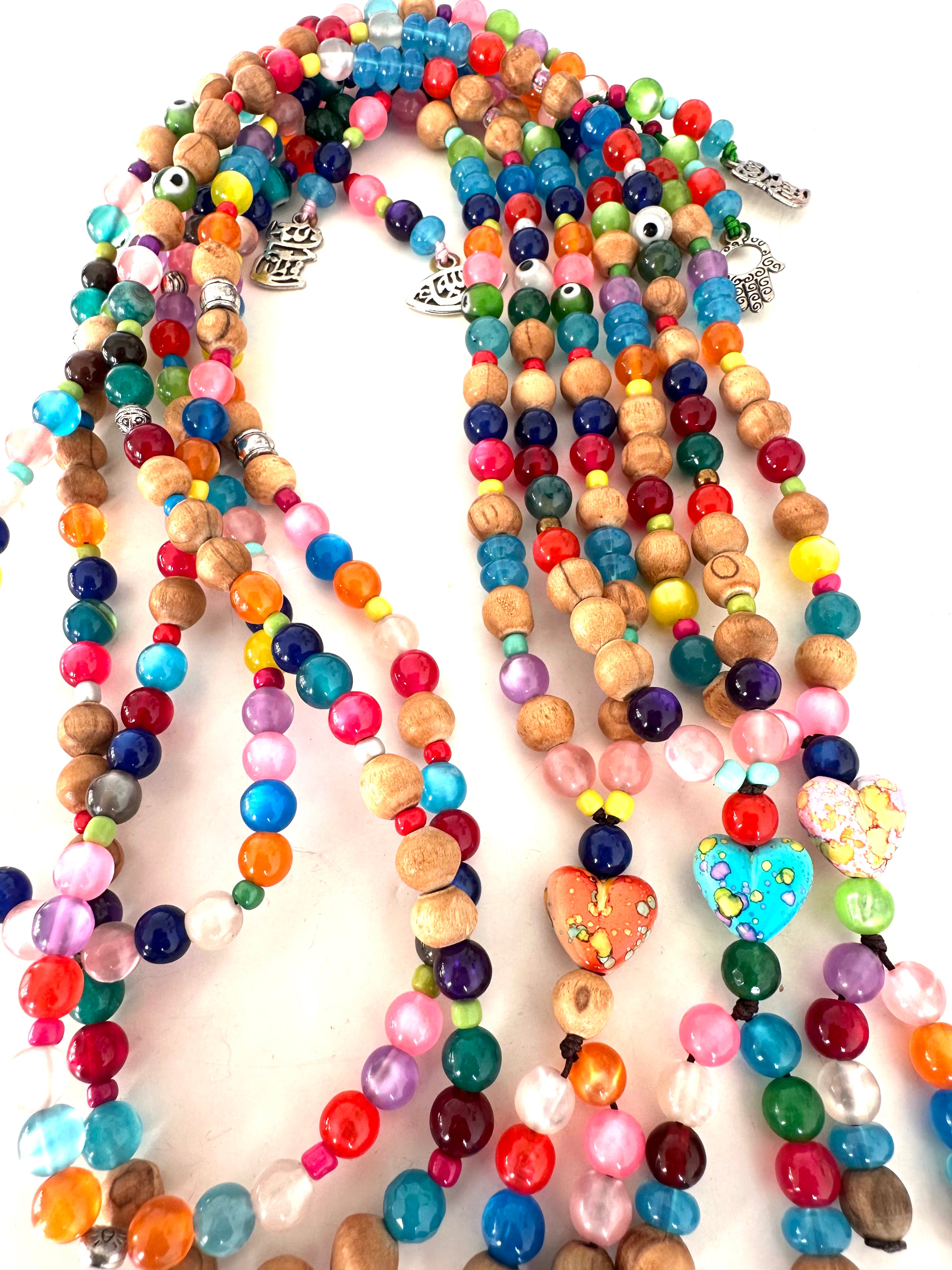 COLORFUL PLASTIC BEADS.