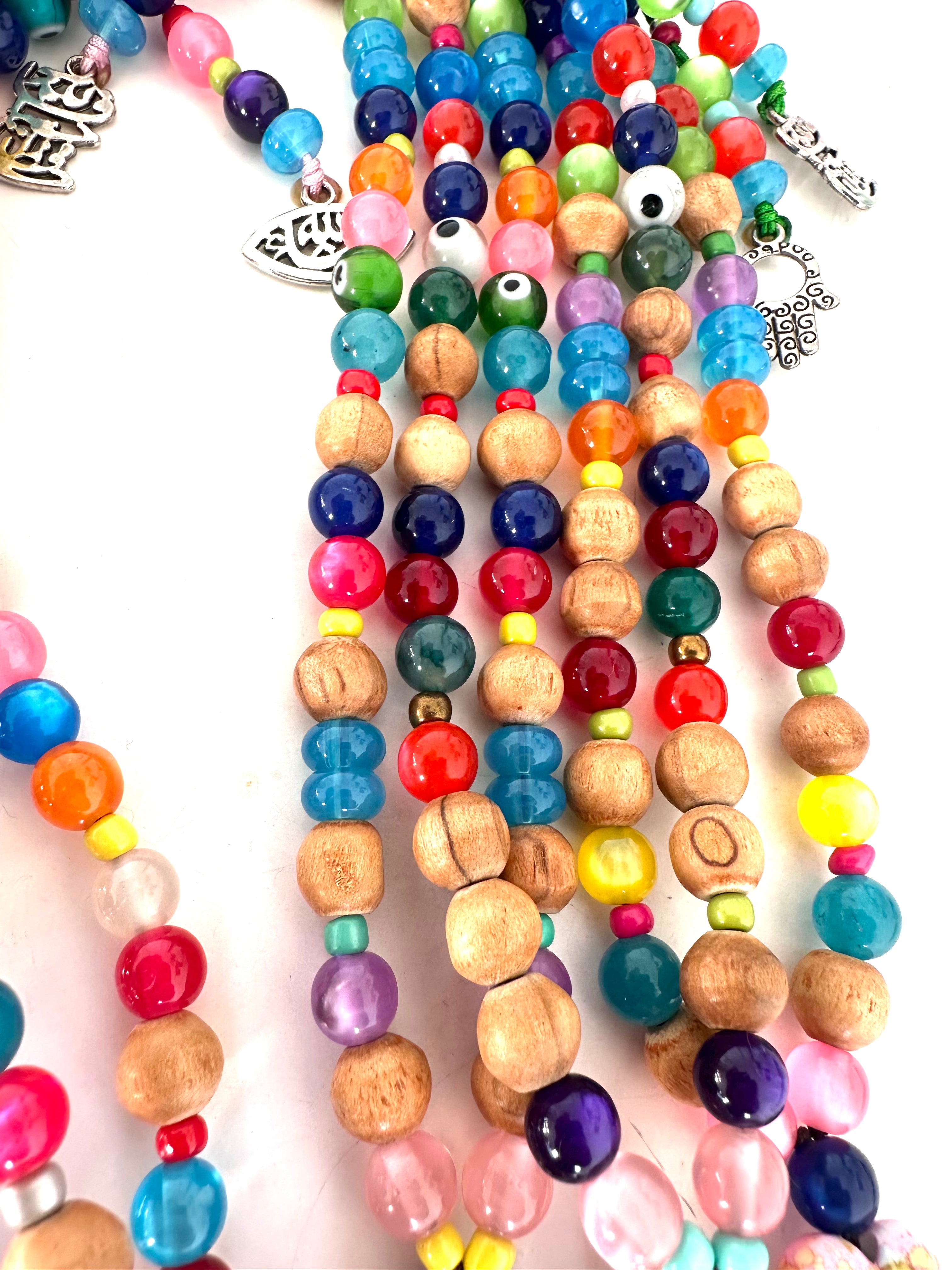 COLORFUL PLASTIC BEADS.