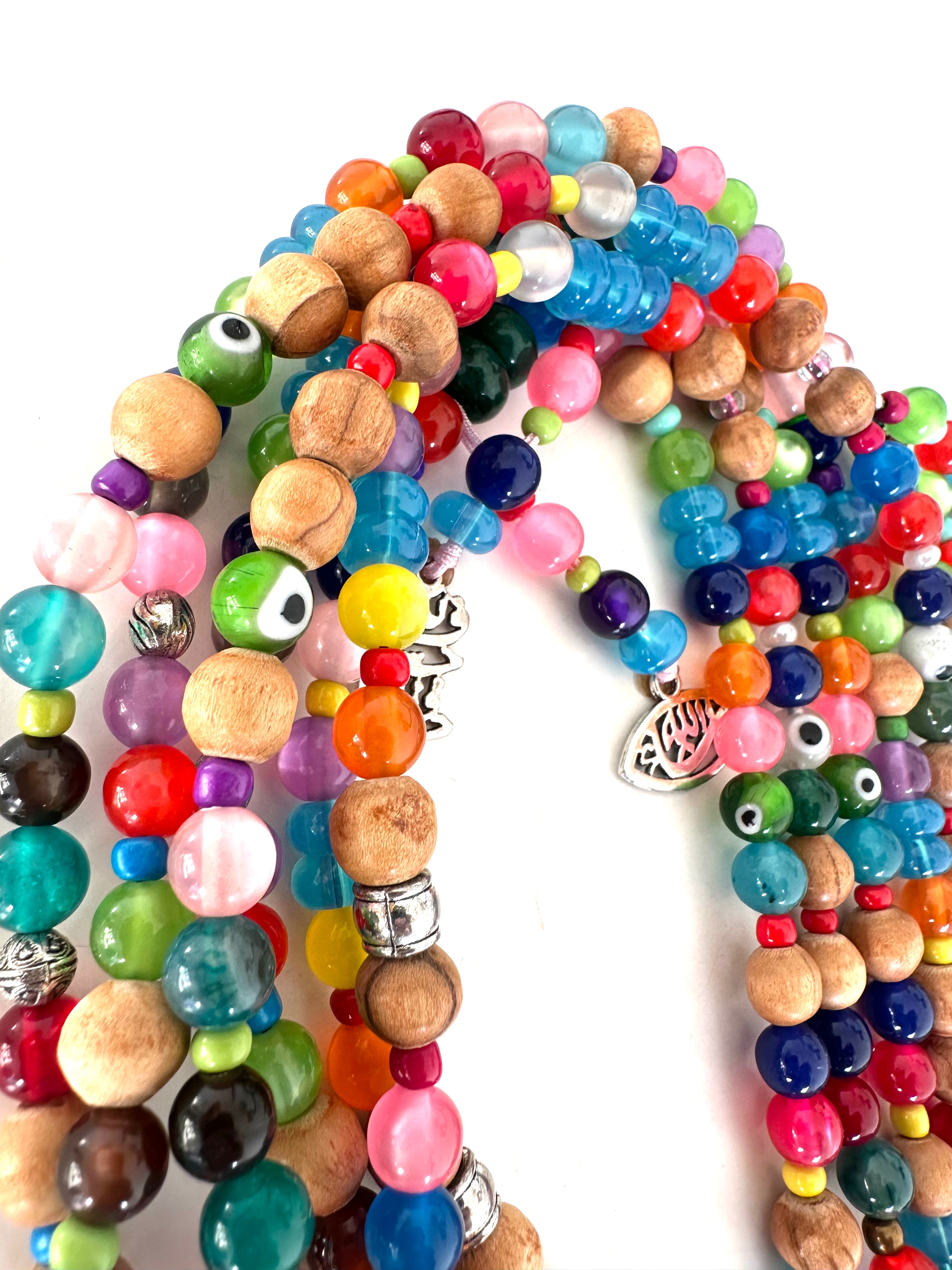 COLORFUL PLASTIC BEADS.