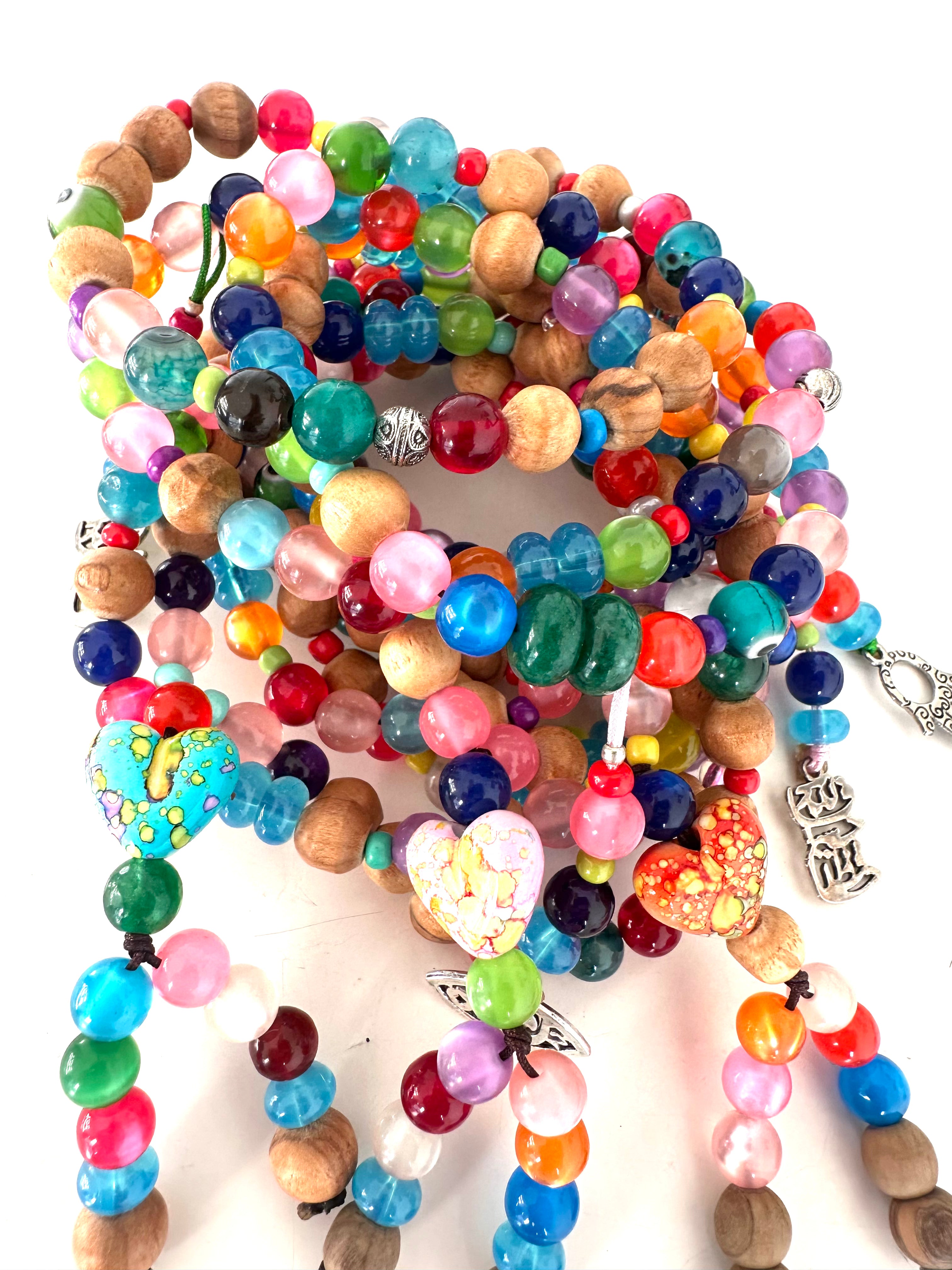COLORFUL PLASTIC BEADS.